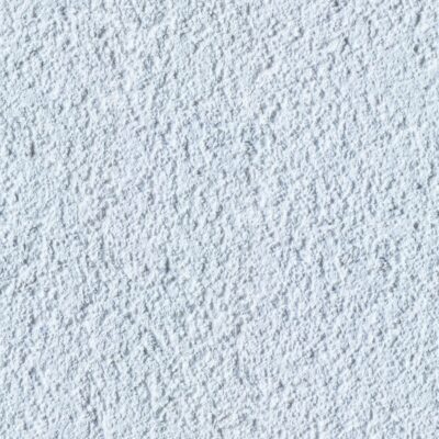 White rough plaster wall seamless texture