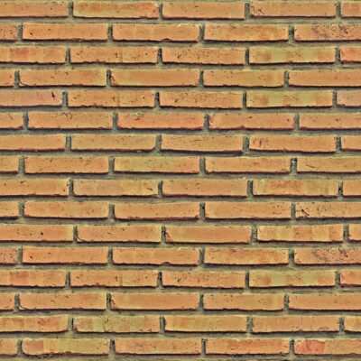 ocher brick wall seamless texture