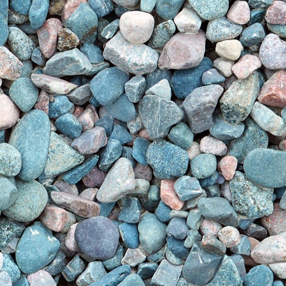 Blue and white river pebbles close up