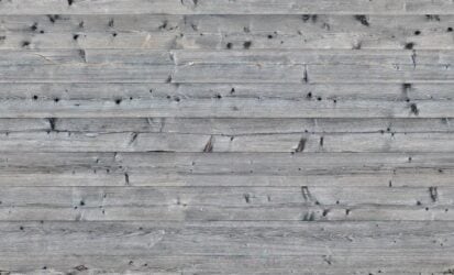 Unpainted wood plank fence