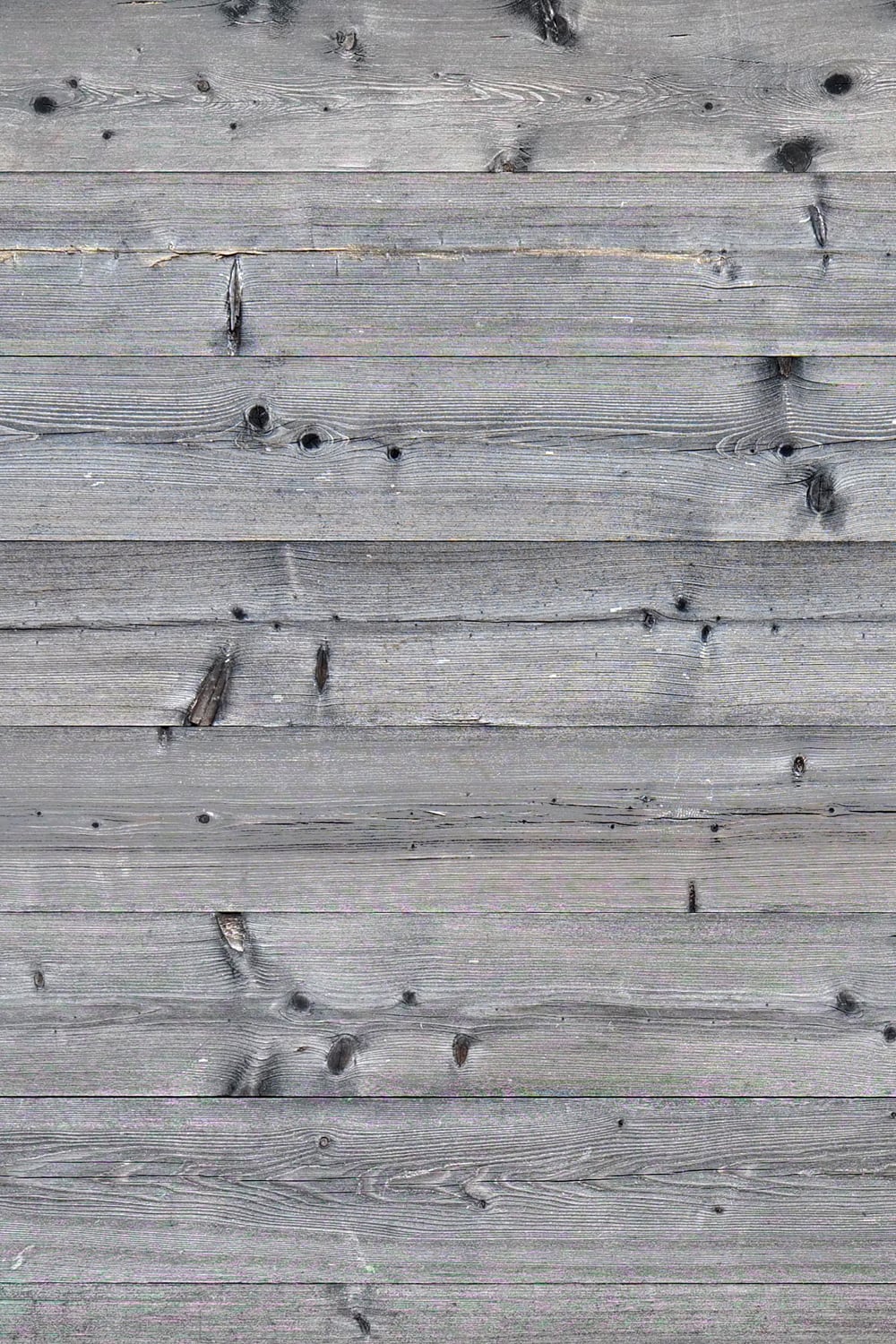 Unpainted wood plank fence - close-up