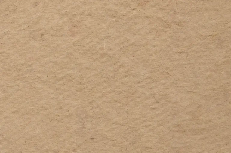 Close-up of an old brown paper with horizontal lines