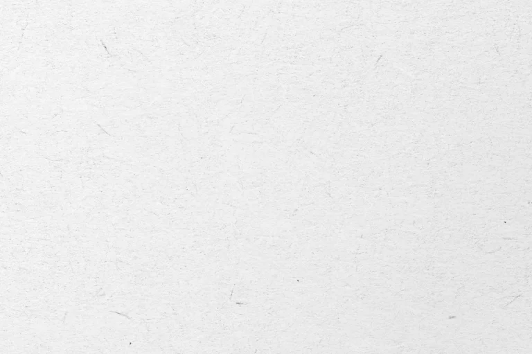 Close-up of a soft handmade paper with subtle specks