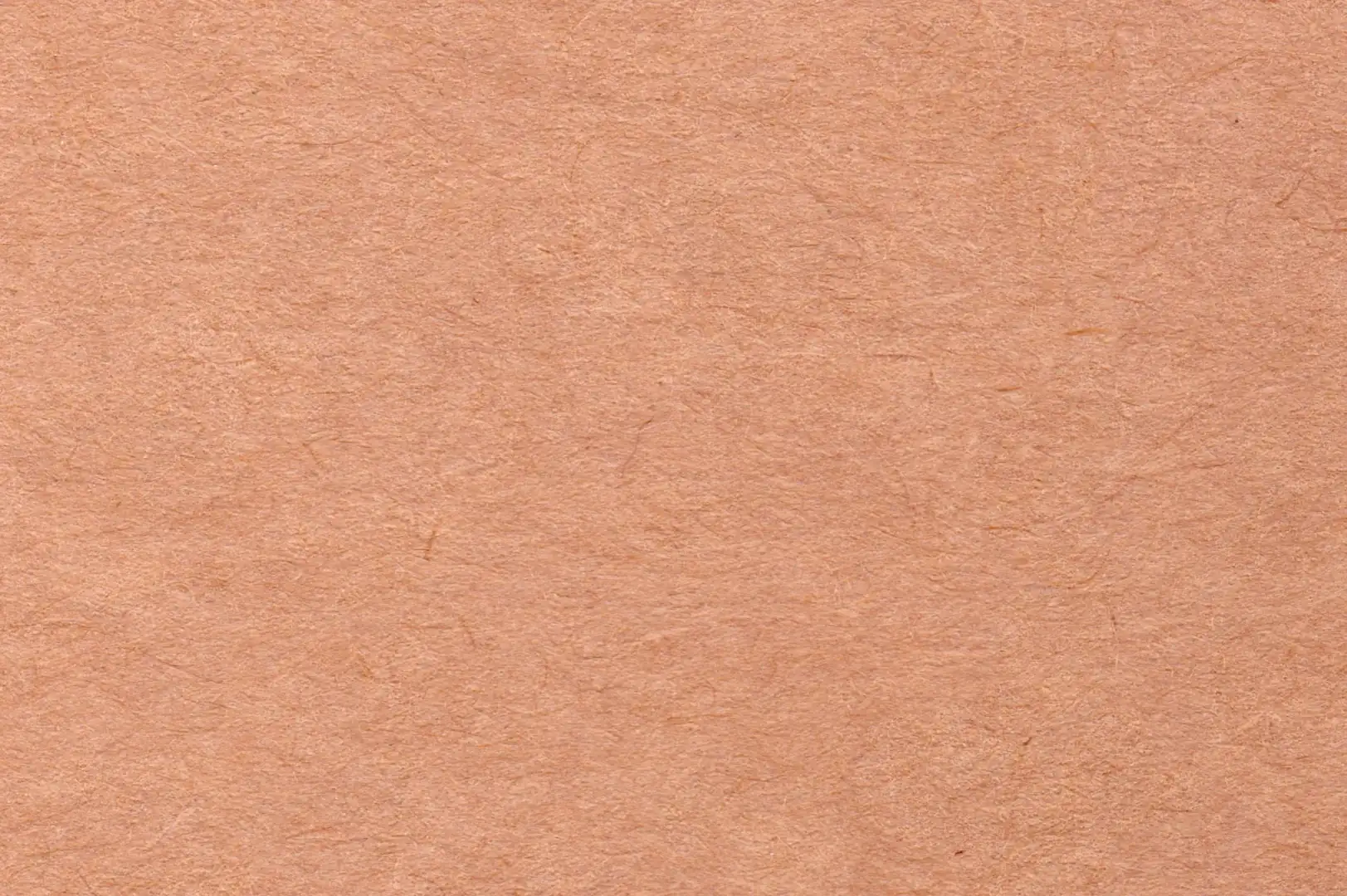 Close up of a thick light brown cardboard paper