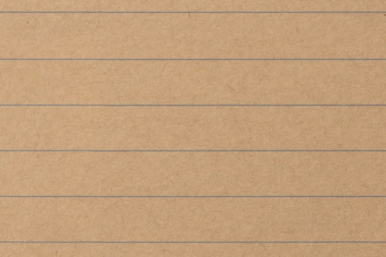 Close-up of a ruled ochre notepad paper