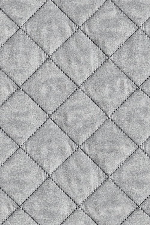 Close-up of a shining diamond patterned nylon jacket