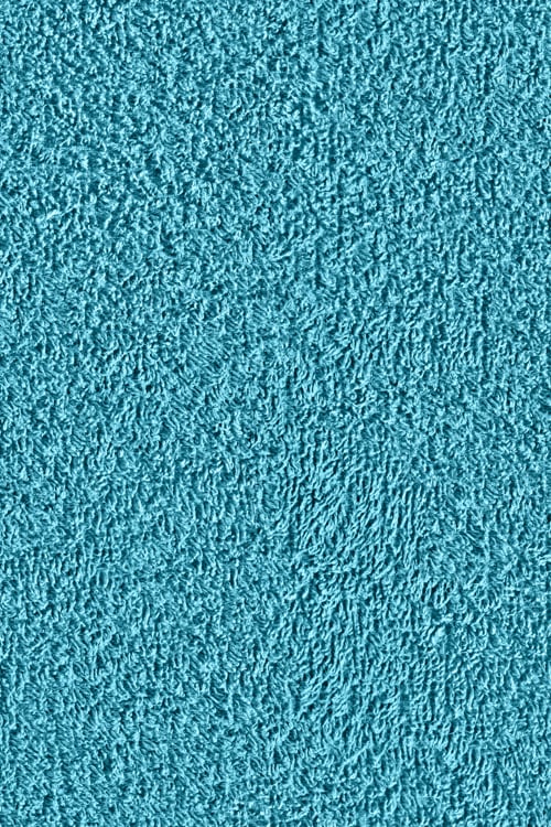 Close-up of a blue fluffy cotton towel