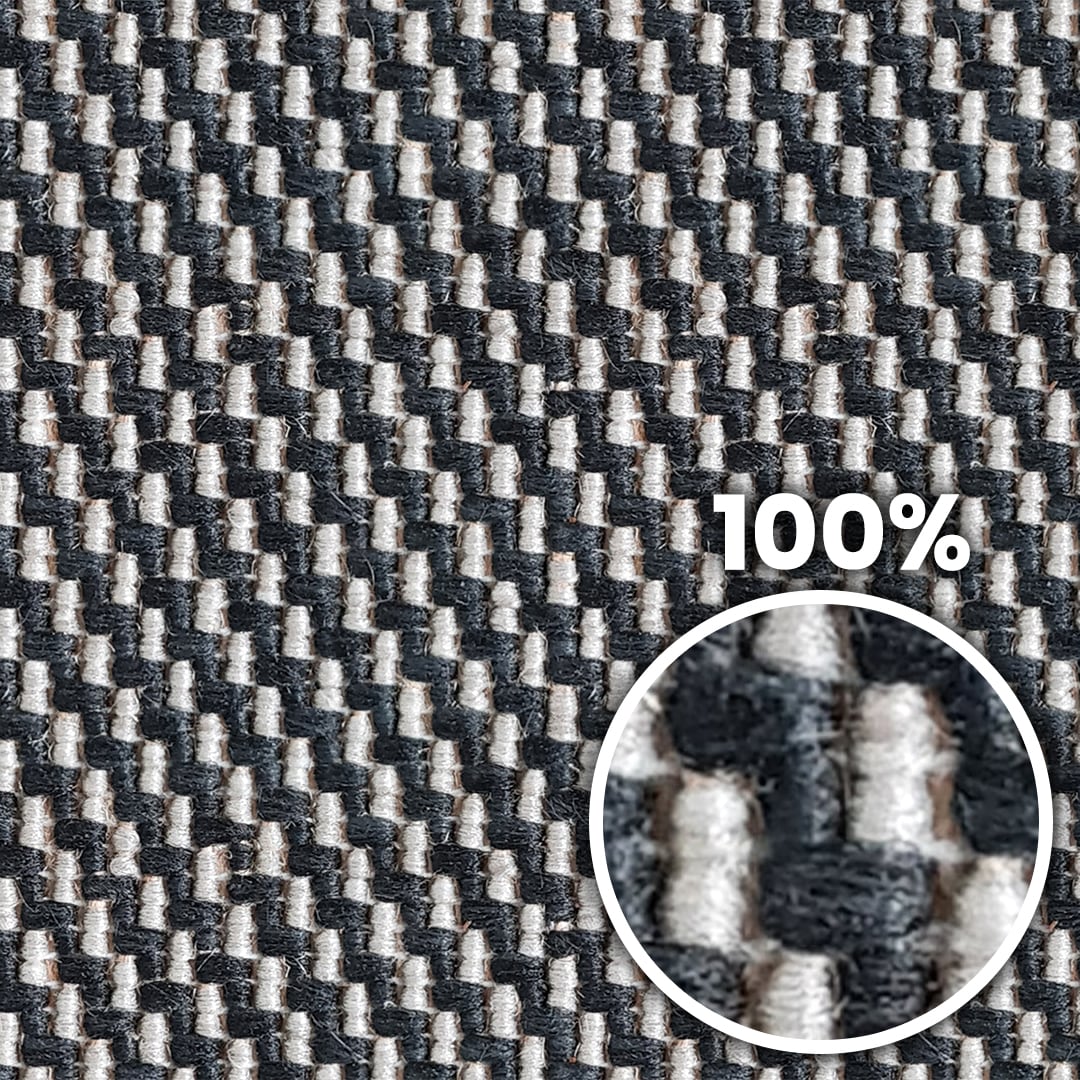 Tiling preview of a rough carpet with black and white fibers arranged in a zigzag pattern