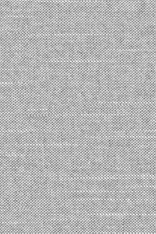 Close-up of a light grey woven tablecloth
