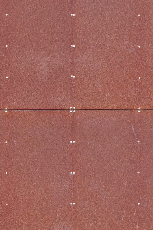 Rusty Metal Sheet Cladding Facade