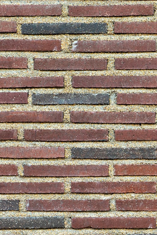 Long Decorative Red and Black Brick Wall