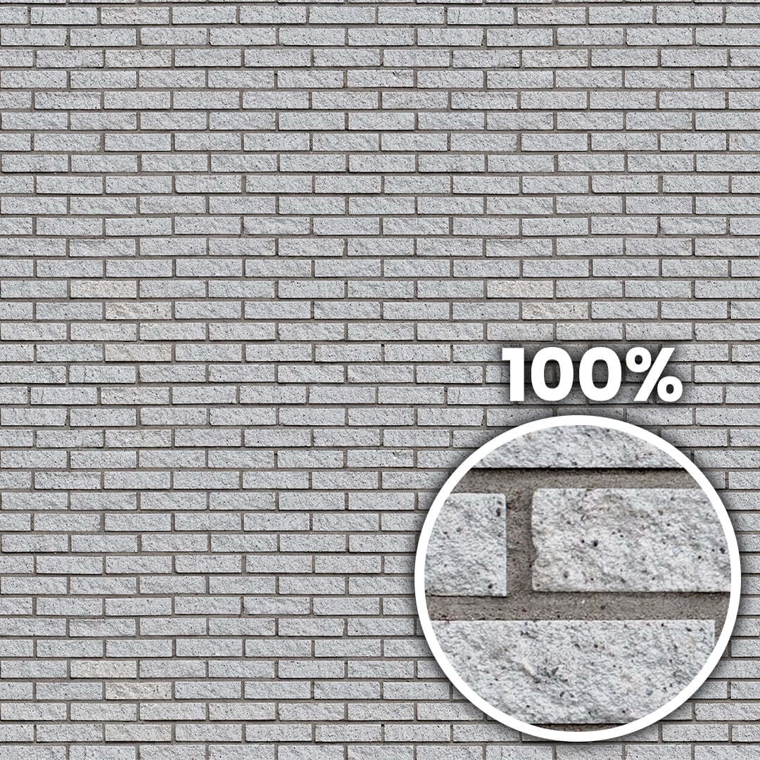 Tiling preview of a white stonelike decorative brick wall