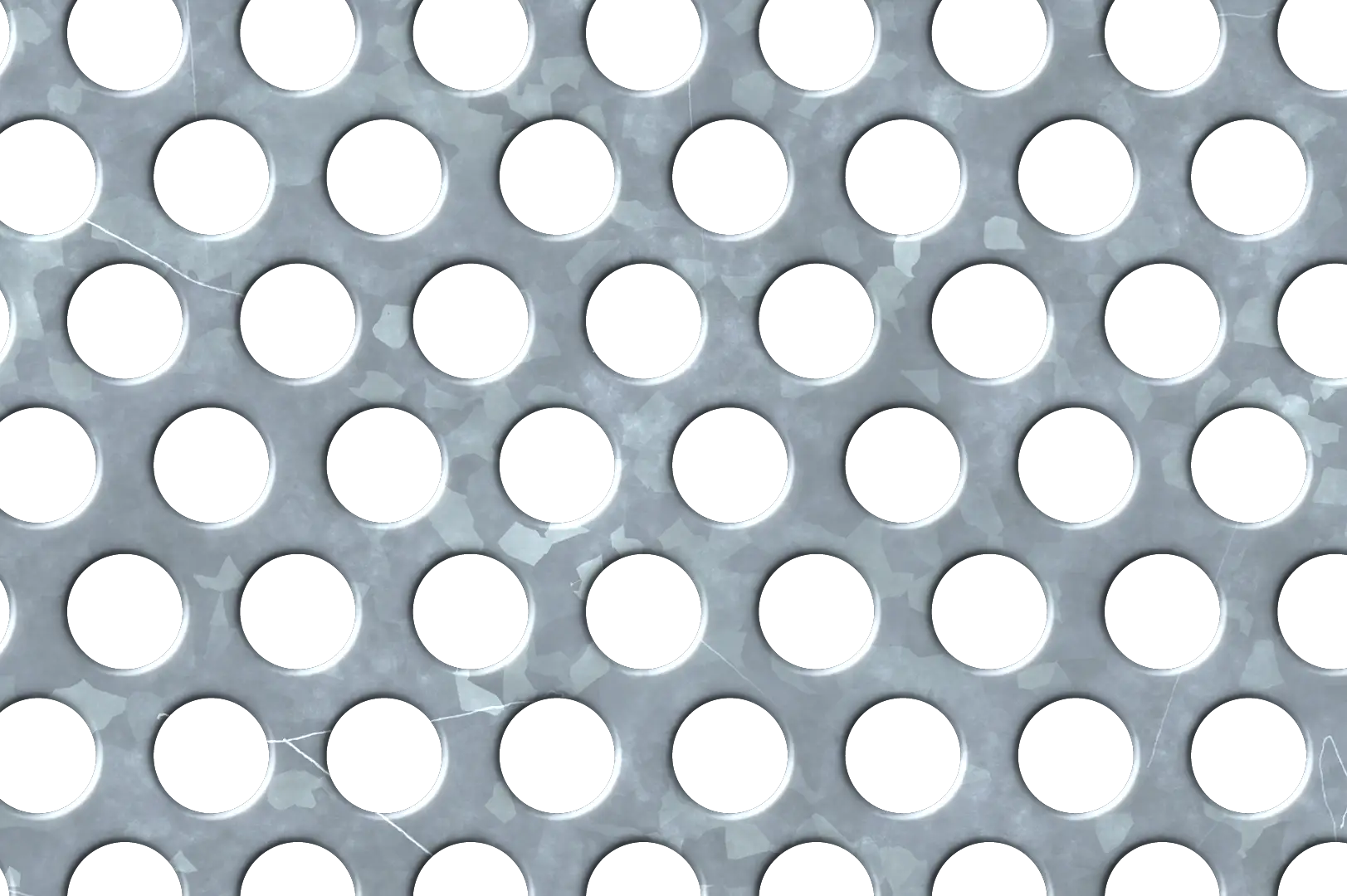 Close-up of a clean galvanized perforated metal panel with circular holes