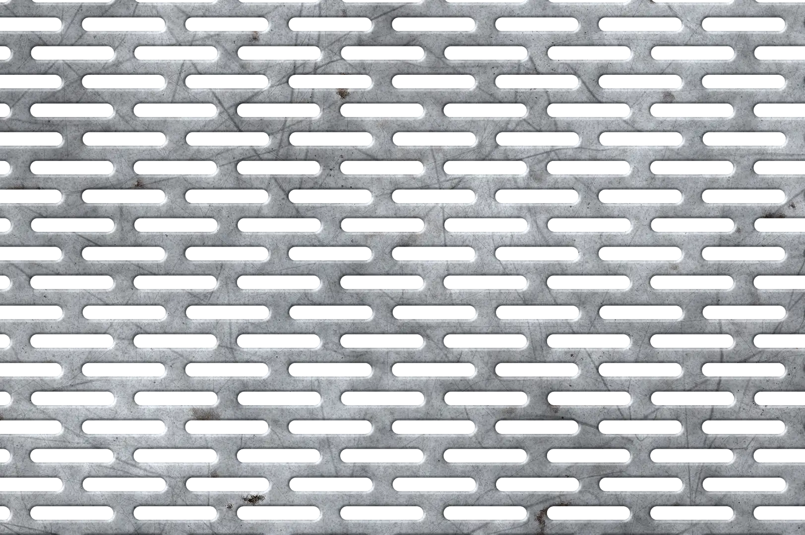 Close-up of a perforated metal sheet with elongated pill shaped holes with scratches