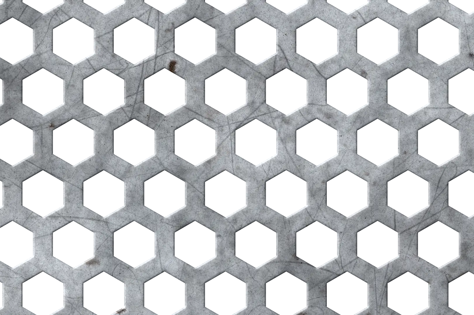 Close-up of a hexagonal perforated metal sheet with scratches