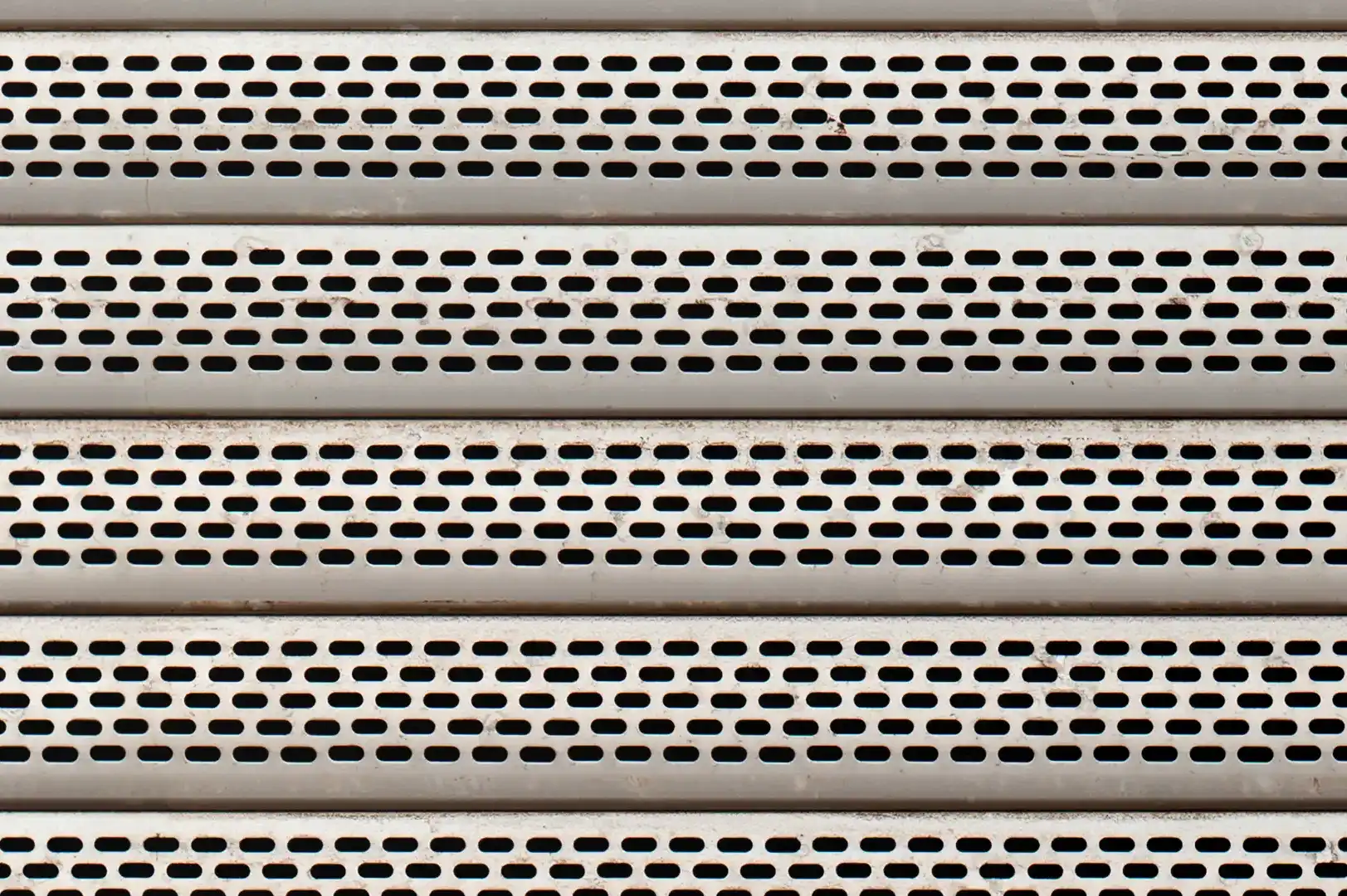 Close-up of a perforated shop front roller shutter