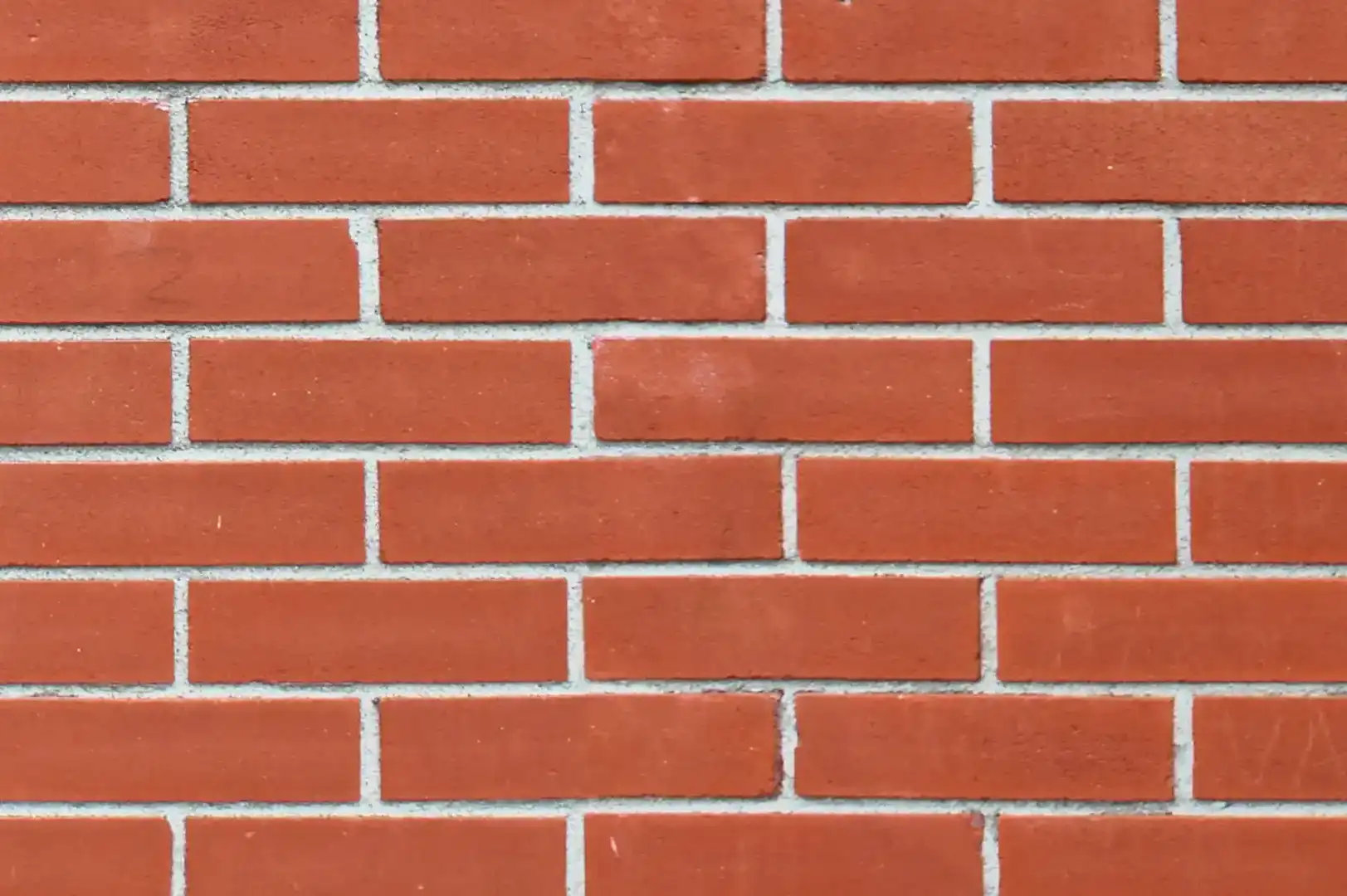 Close-up of a decorative clean red brick wall