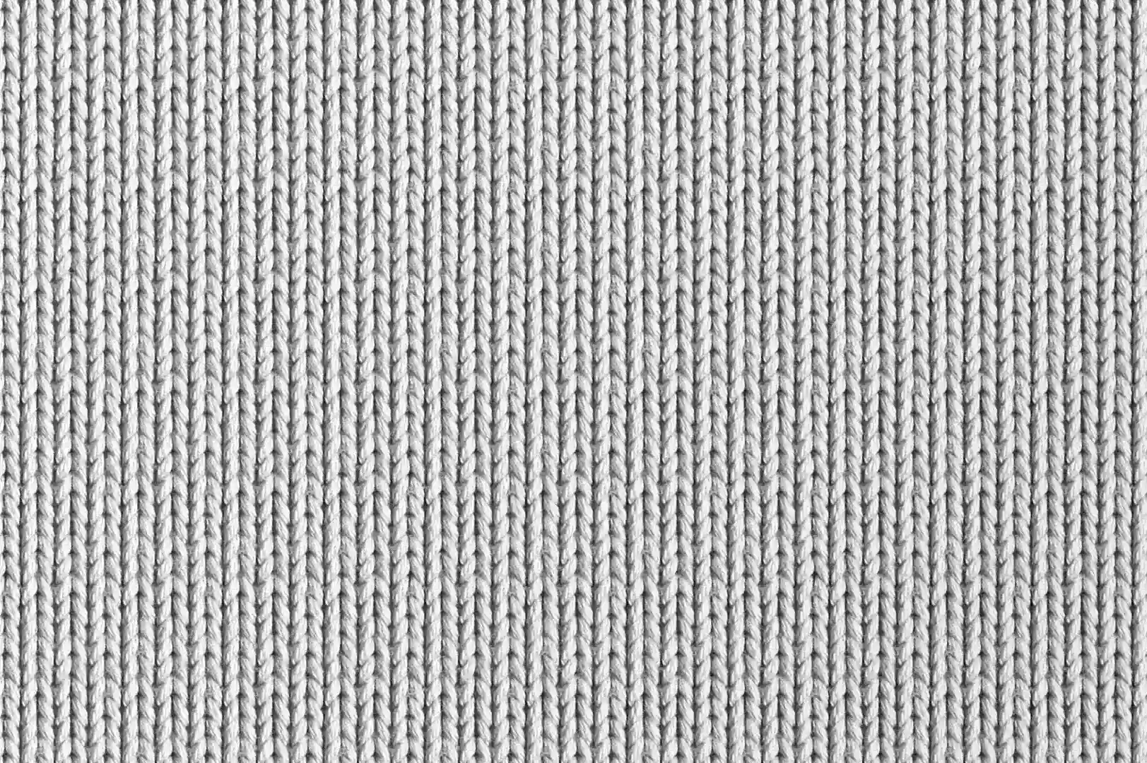 Close up of a simple knitted white polyester pullover