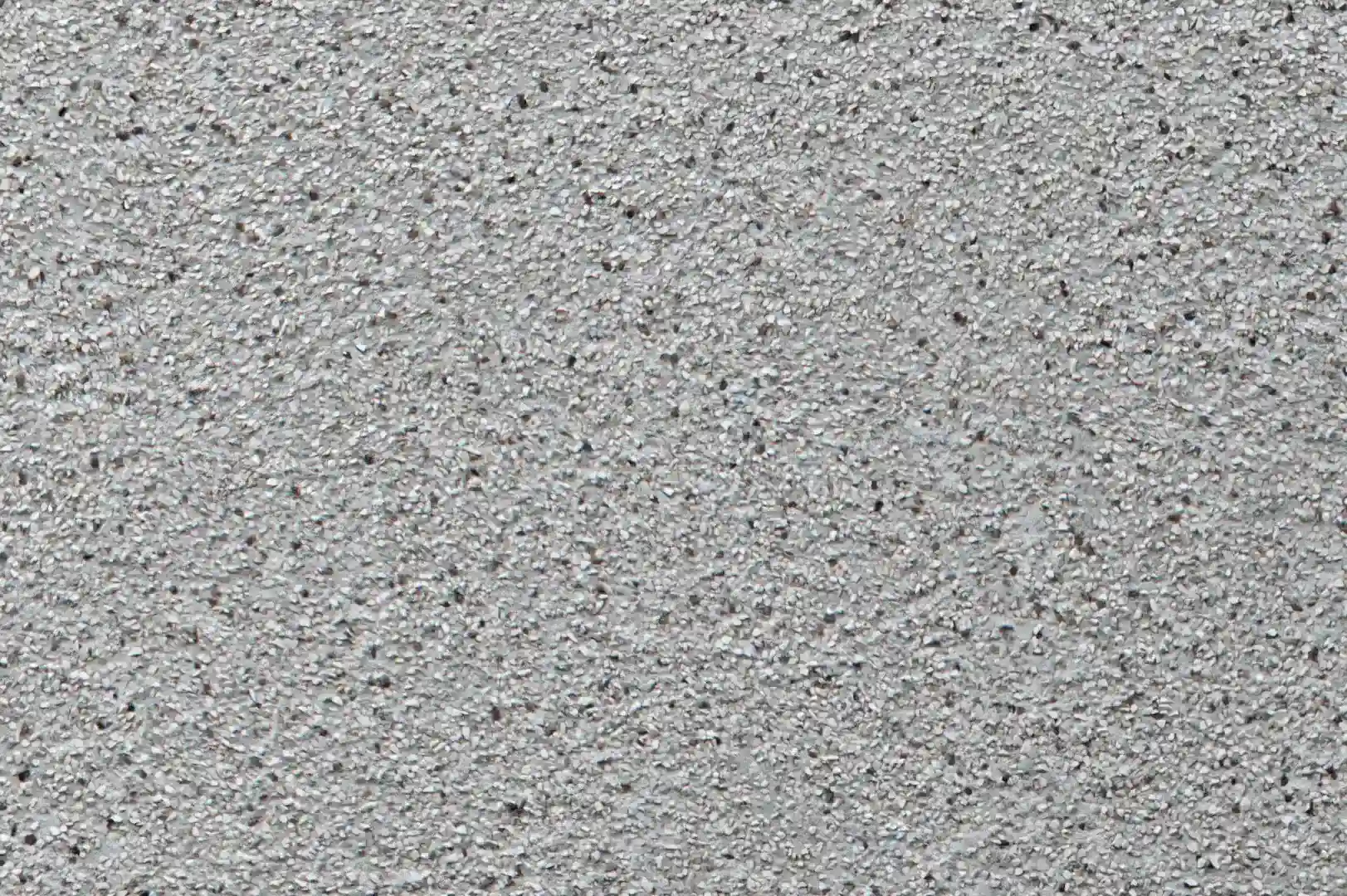 Close-up of a relief plaster with gravel chips
