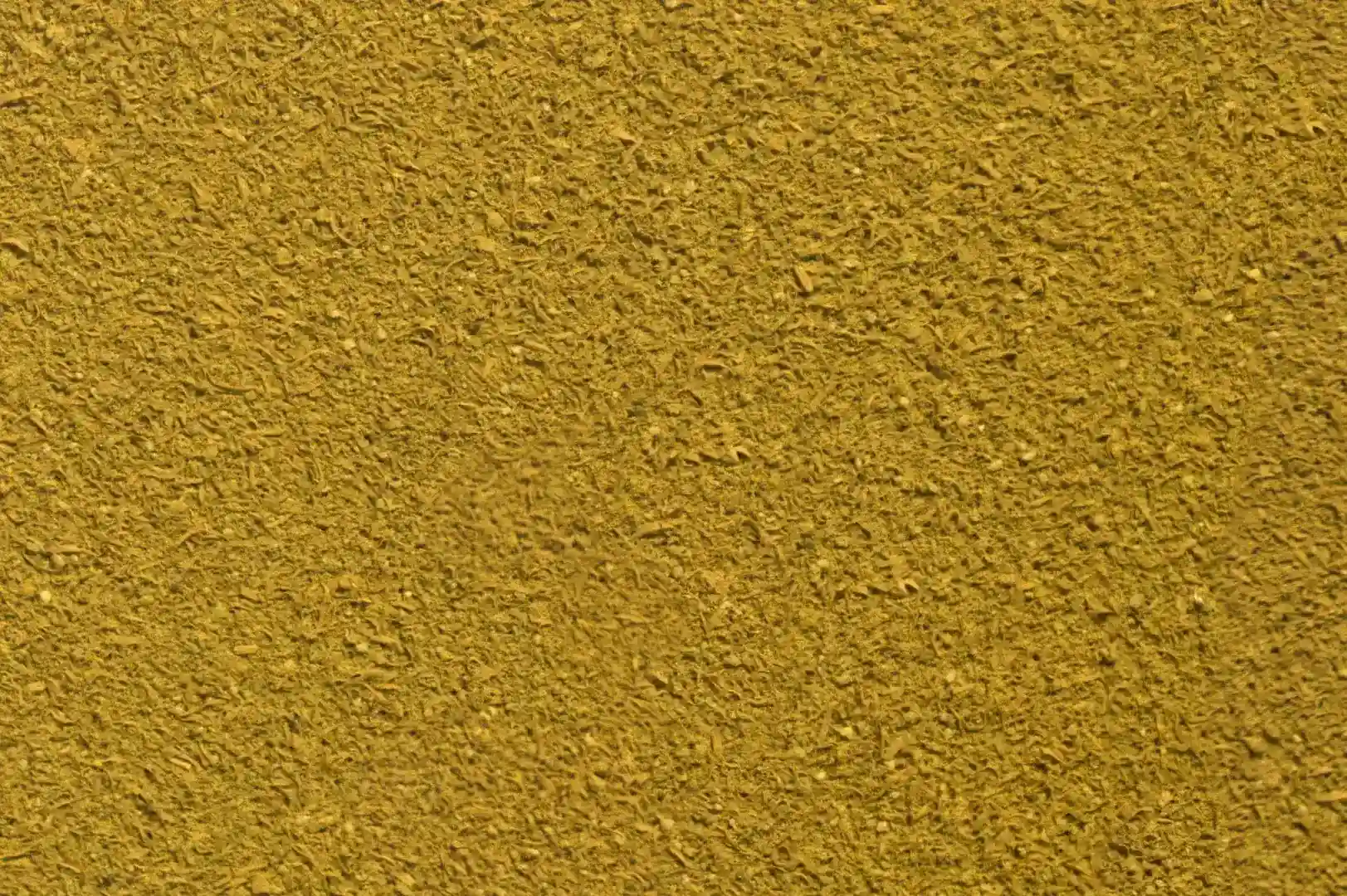 Close-up of a mud wall with straw