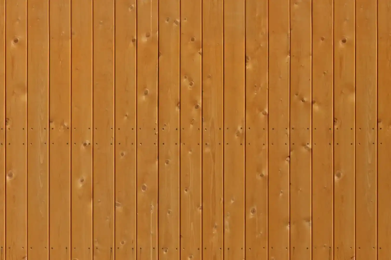 Close-up of a varnished exterior wood paneling