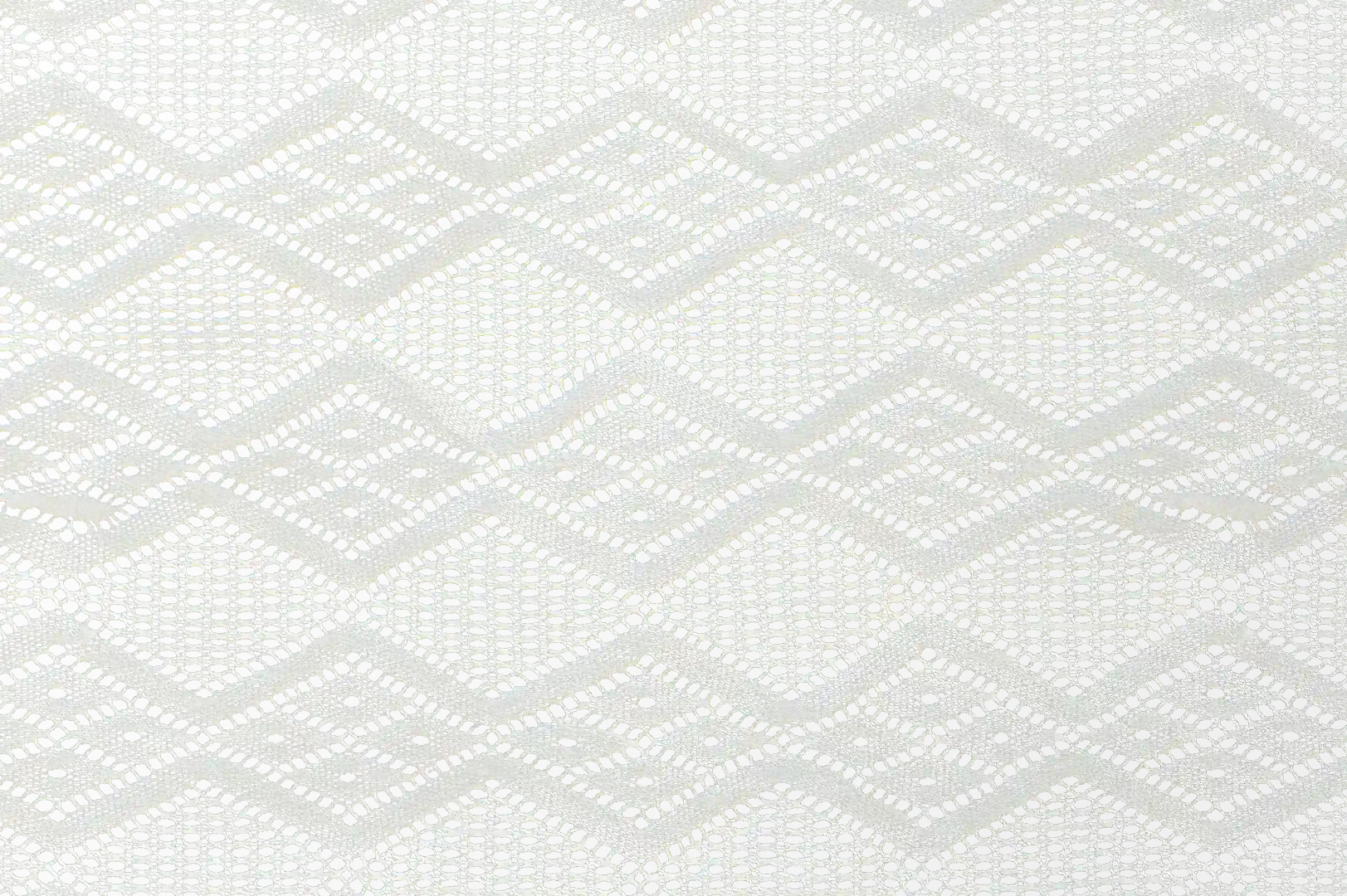 Close-up of a crocheted diamond patterned cloth