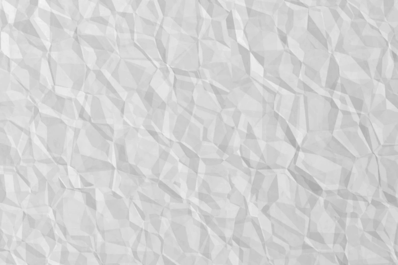 Close-up of a sheet of white creased paper