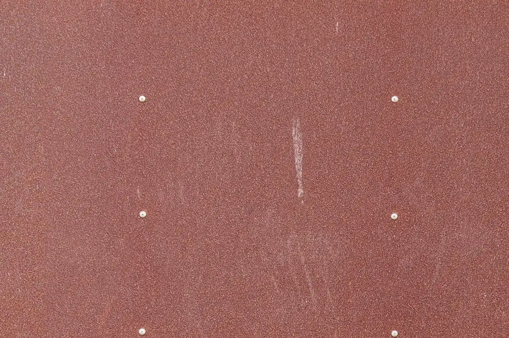 Close-up of a decorative rusty metal sheet cladding