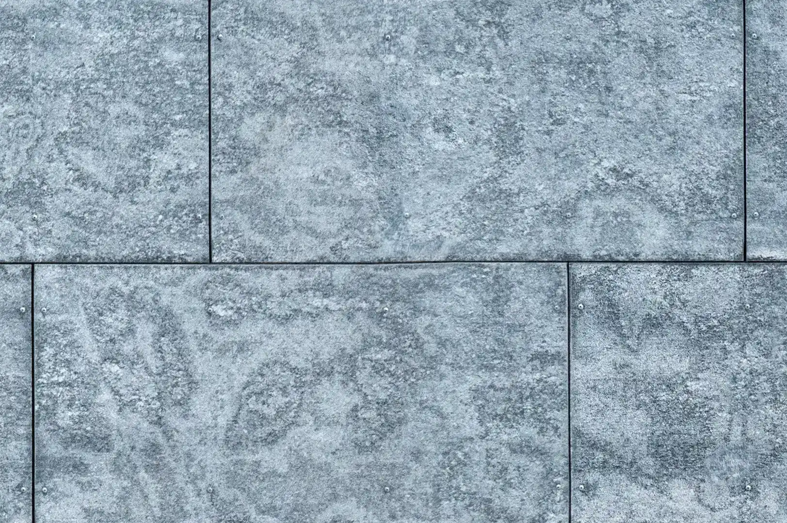 Close-up of a contemporary facade with rectangular concrete panels