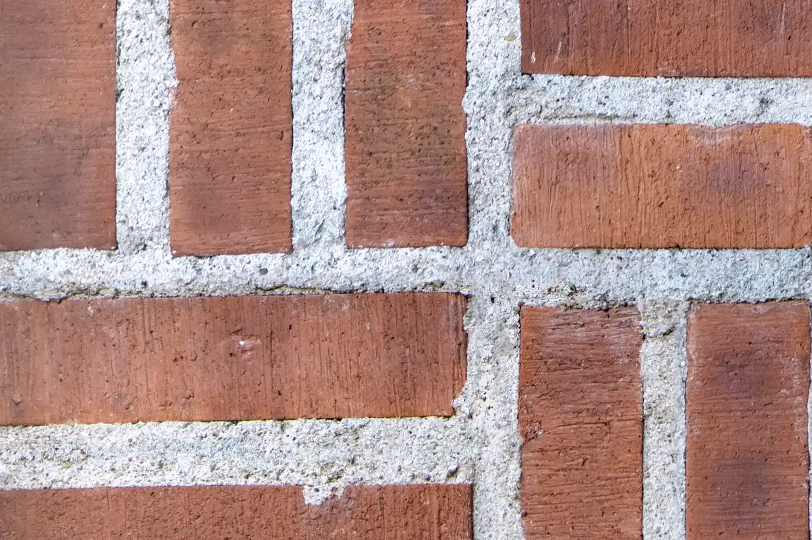 Close-up of a crosshatch brick wall