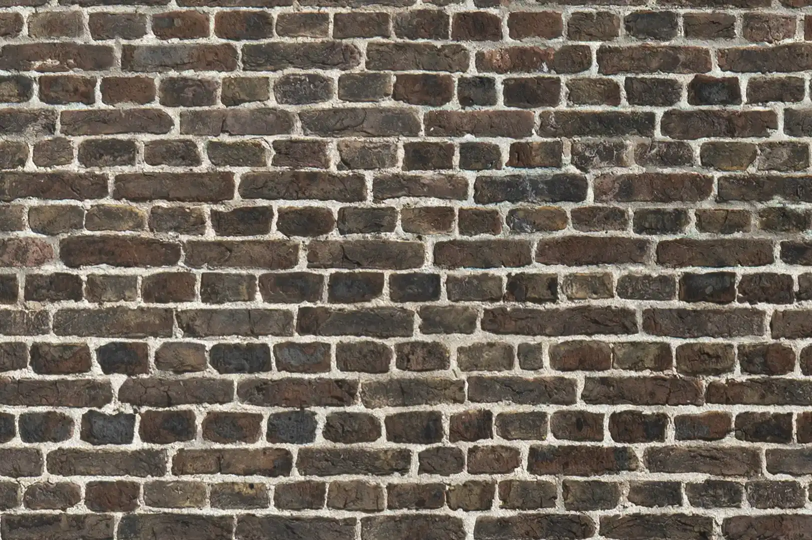 Close-up of an old church brick wall with soft tones browns and greens