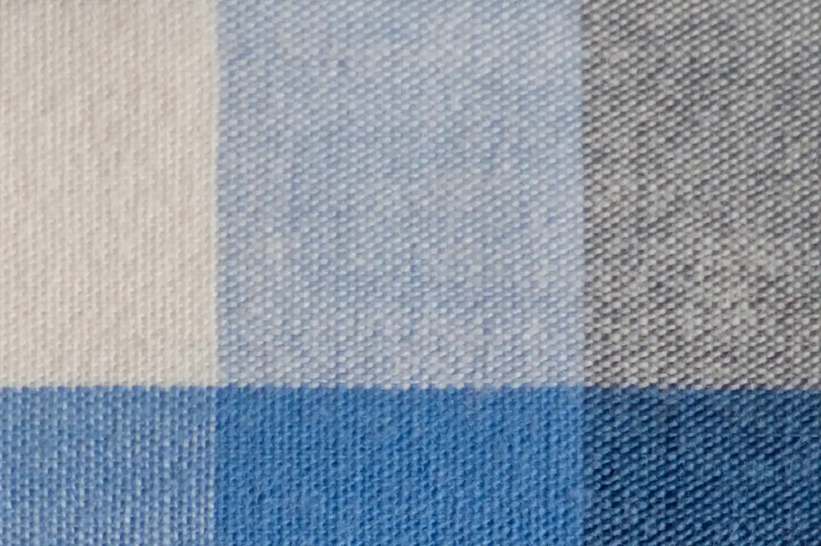 Close-up of fine cotton fabric with a checkerboard pattern