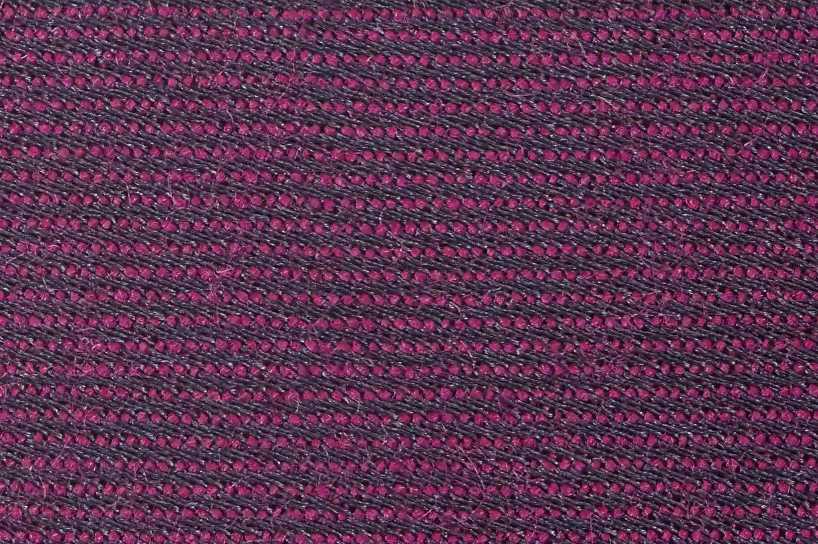 Close-up of a purple parallel lines knitted fabrics