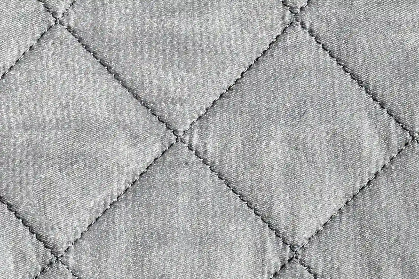 Close-up of a shining diamond patterned nylon jacket