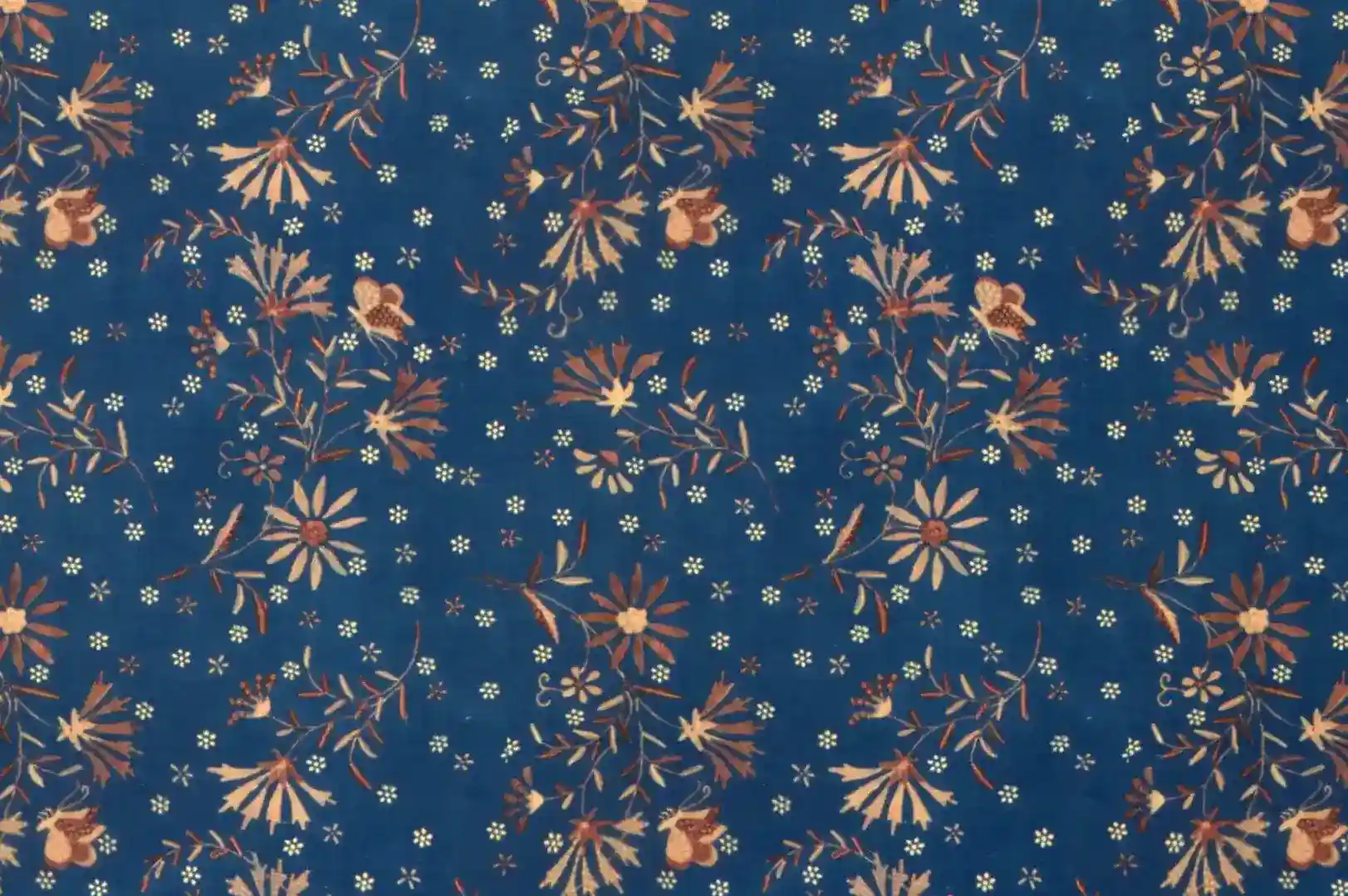 Close-up of a cloth with hip floral pattern on a dark blue background