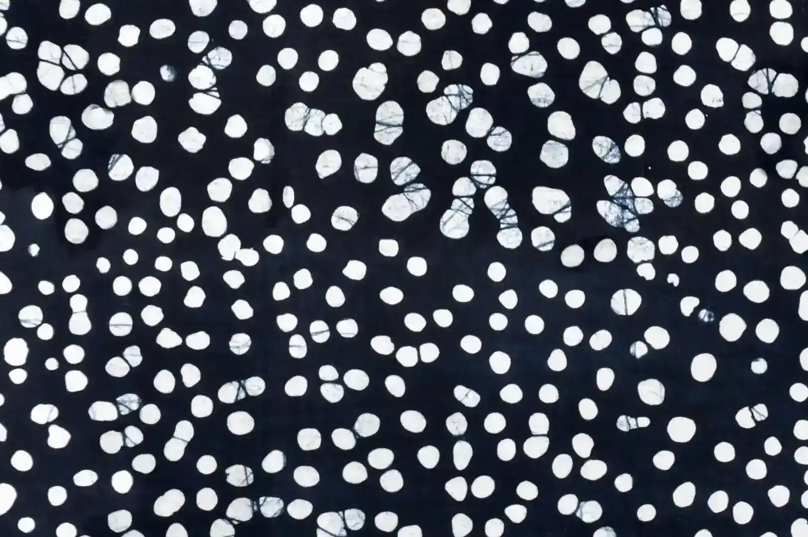Close-up of a hand painted polka dots pattern