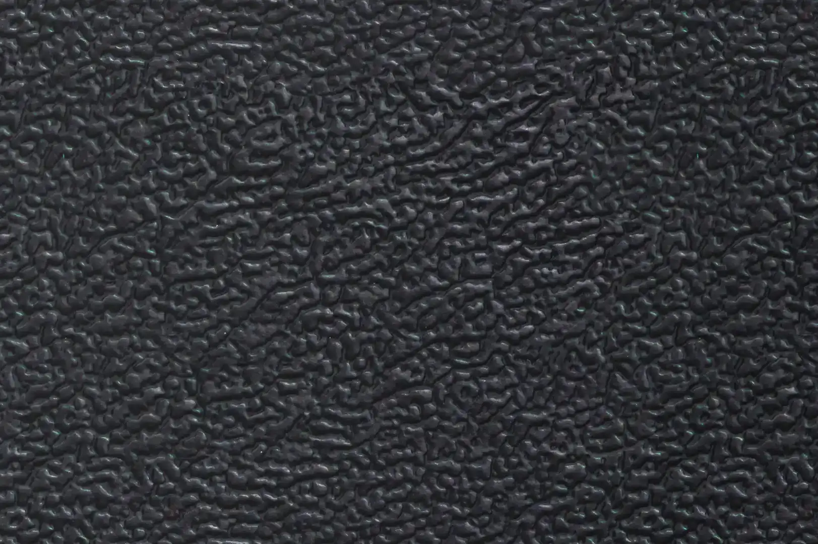 Close-up of a shiny black leather