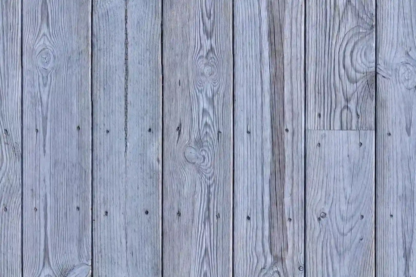Close-up of an outdoor untreated wooden planks covering