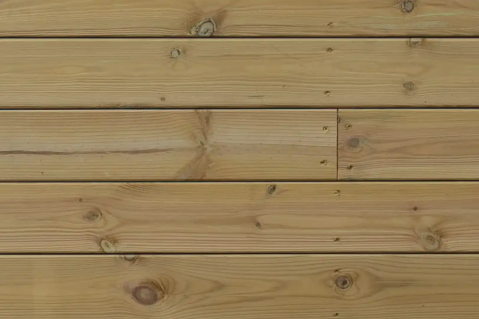 Close-up of a timber-clad exterior in it's natural color