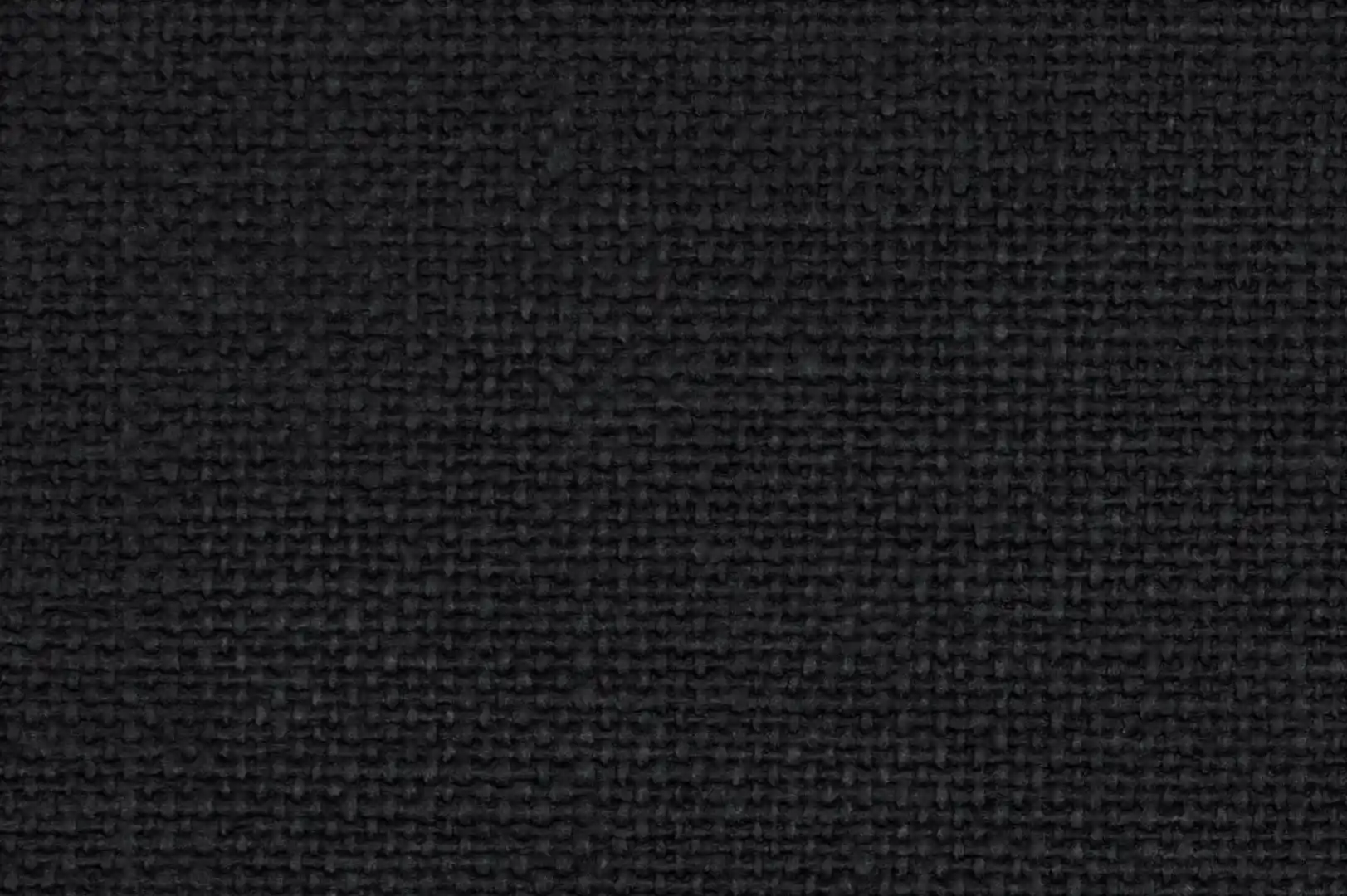 Close-up of a black canvas textured paper